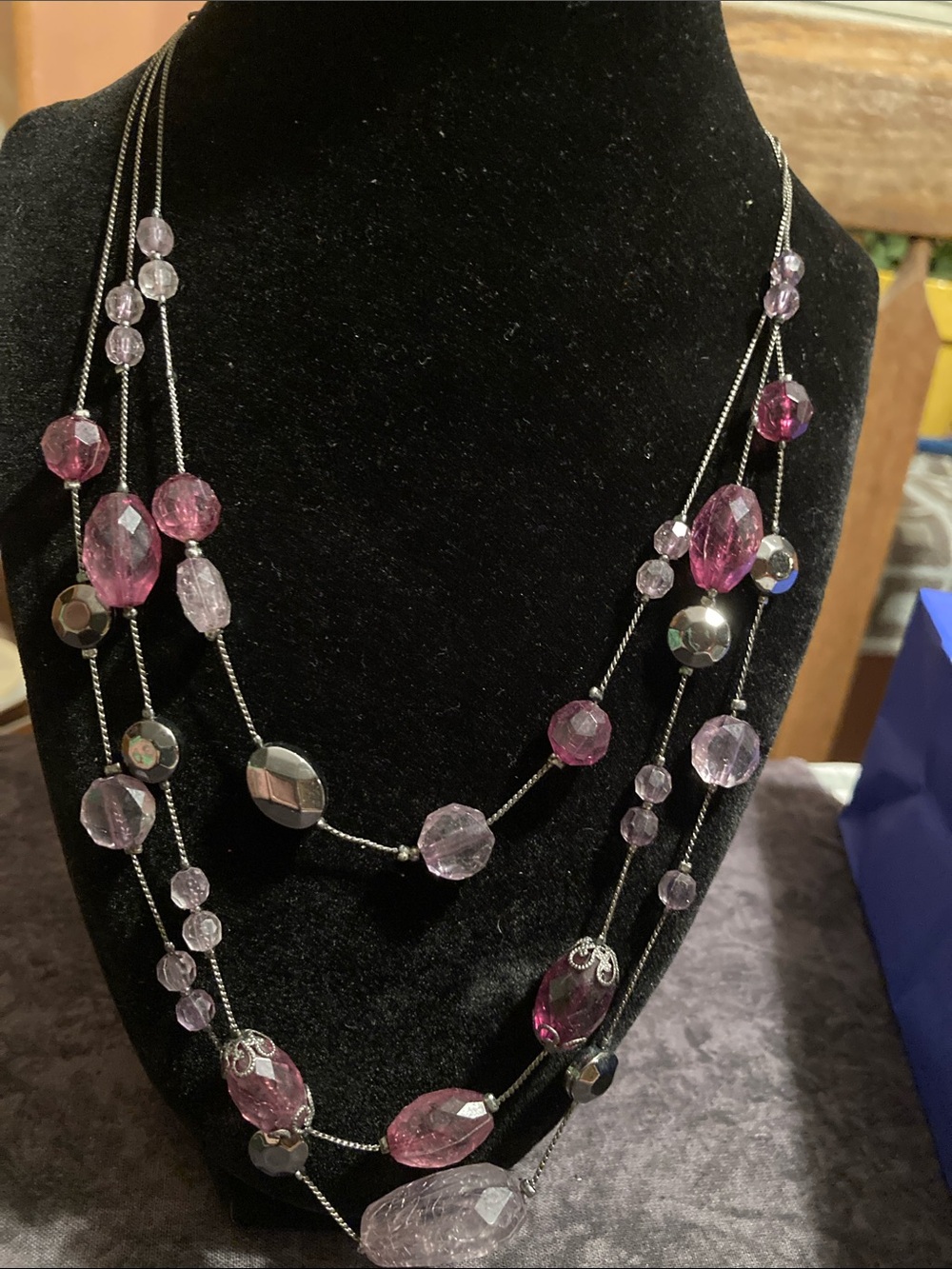 Triple strand purple and clear faceted bead necklace